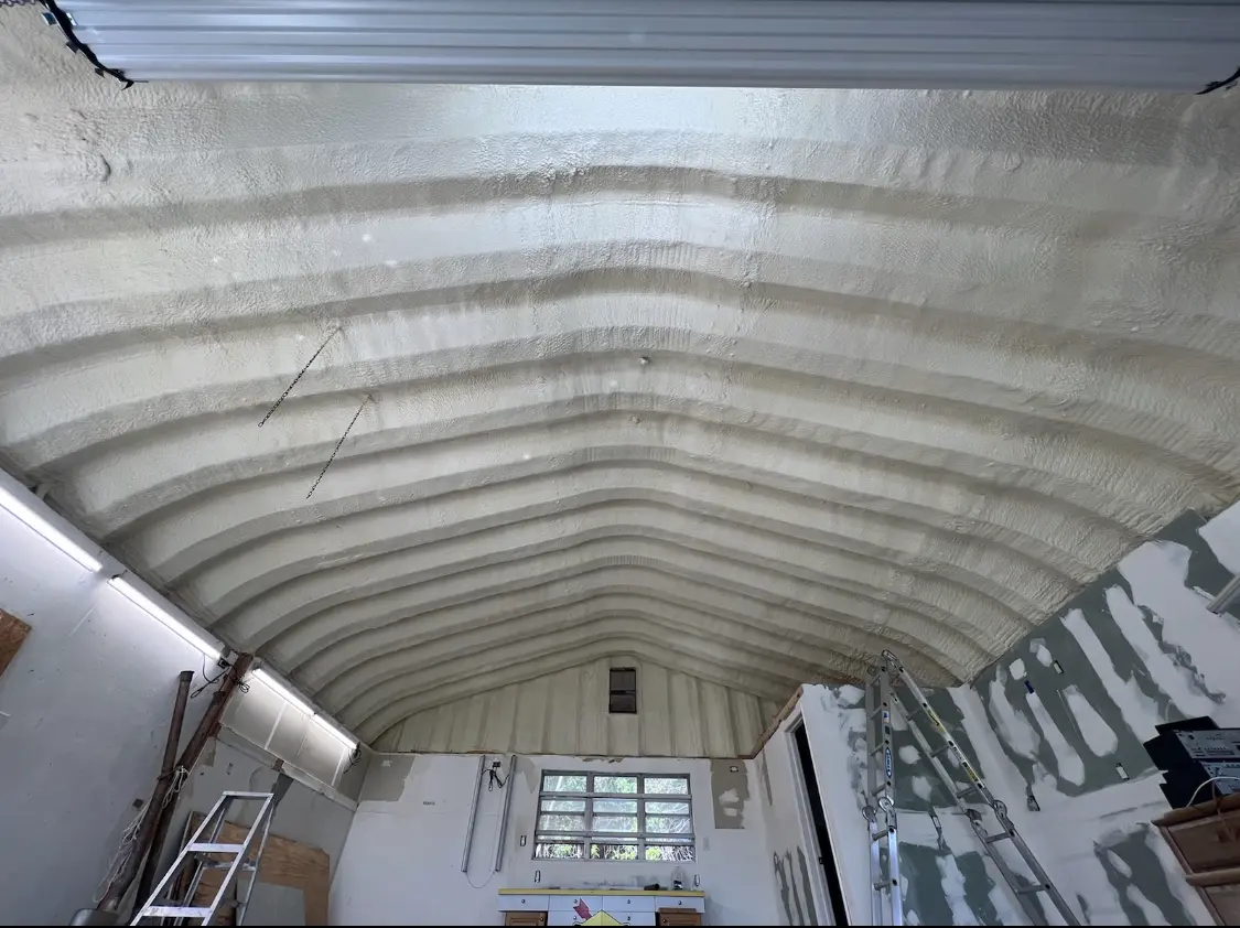 Spray polyurethane foam applied to the underside of a metal roof deck in Catalina